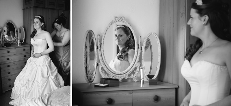 Bride looking at herself in the mirror