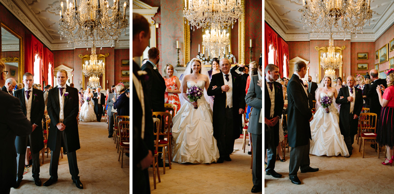 Groom looks back to see his bride walking down the aisle