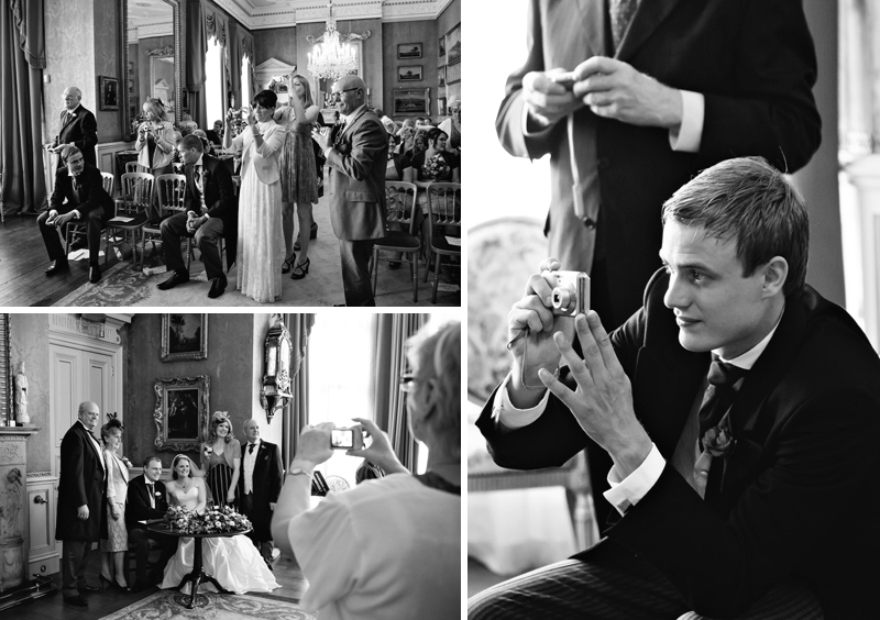 Wedding guests taking photographs