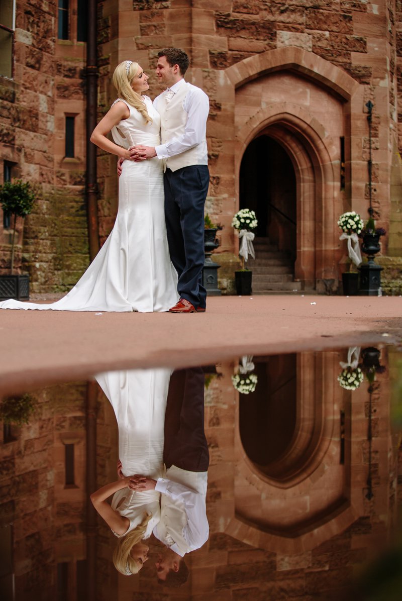 Bride and Groom reflection in water