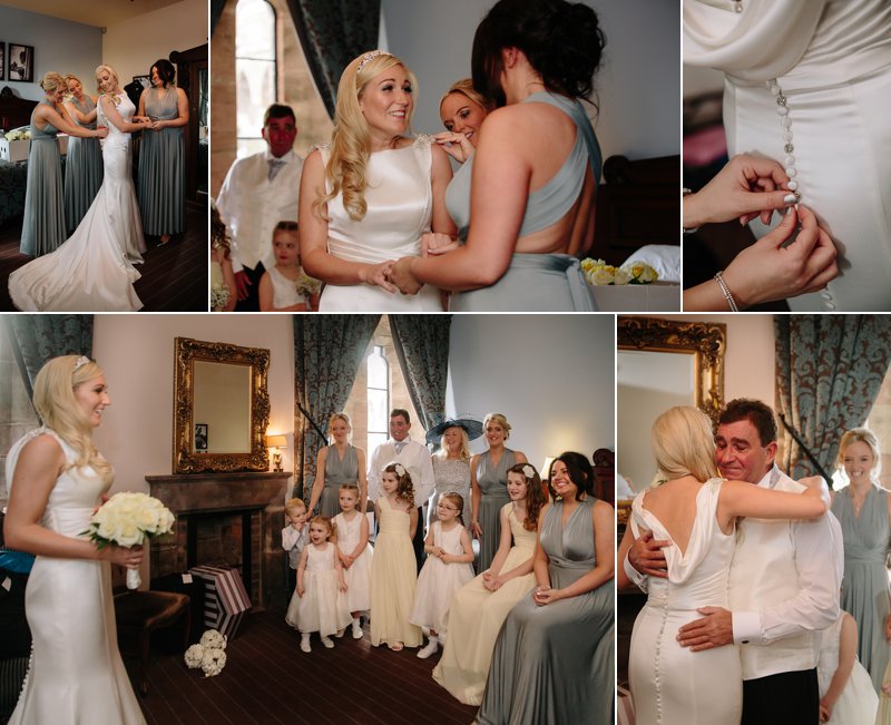 Bridesmaids helping bride in her wedding dress