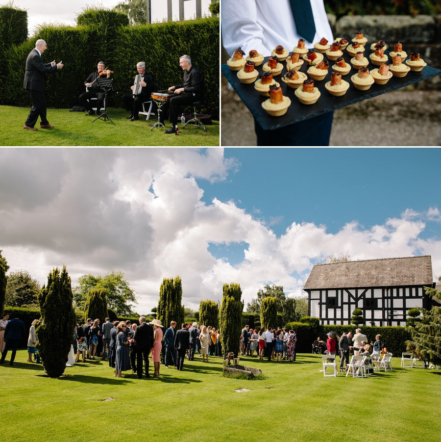 Guests enjoying the drinks reception in the stunning gardens at Holford Estate