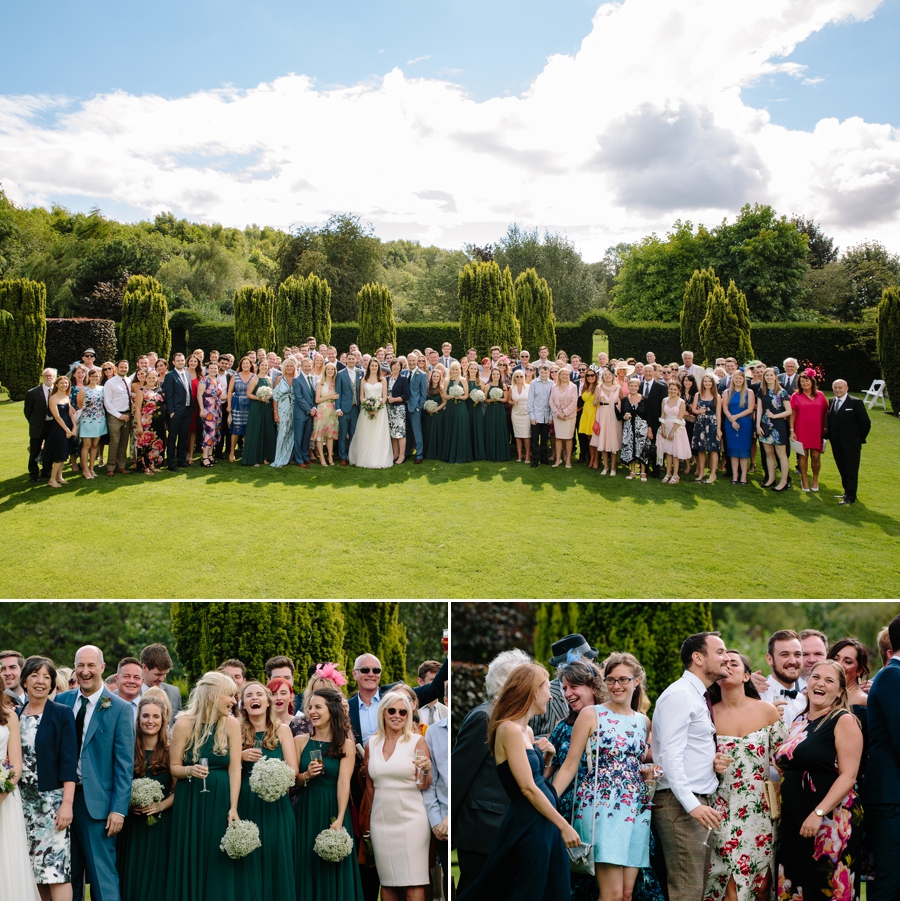 Wedding guests laughing and enjoying the group photographs