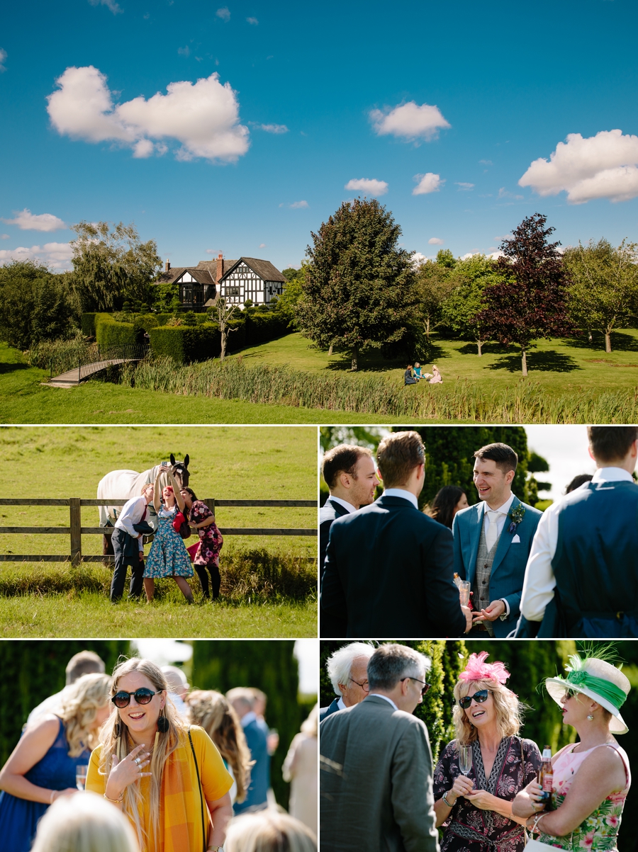 Wedding guests enjoying the afternoon drinks on the lawn