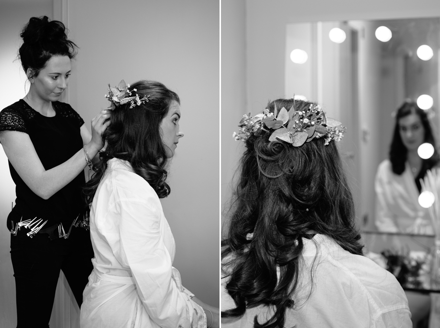 Bride having her hair styled and makeup applied on the morning of the wedding