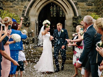 Cheshire Wedding Photography confetti with the bride and groom