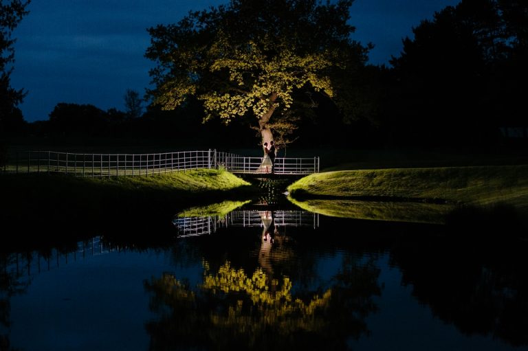 Ivory Florals & Opulent Candle Lit Aisle at Colshaw Hall Wedding Venue