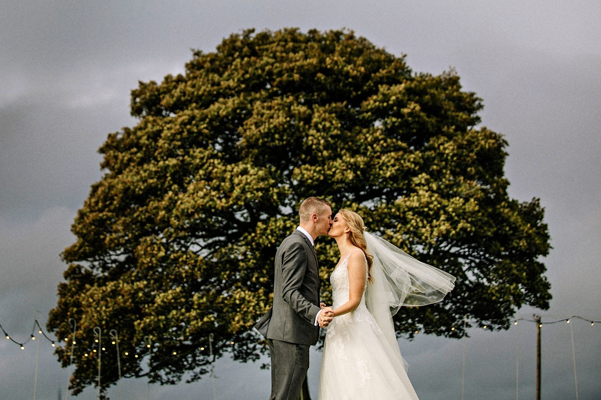 Bride & Groom kiss