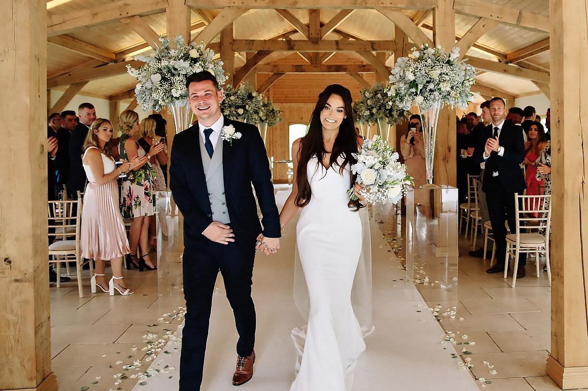 Bride & Groom walk back down aisle