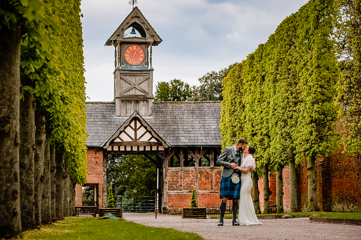 Bride and Groom at the Arley Hall clock tower