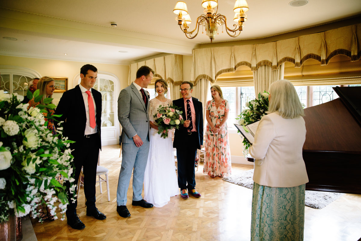 Groom seeing his bride for the first time at Colshaw Hall