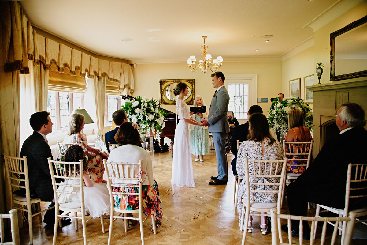 Bride and Groom in the Piano room at Colshaw Hall