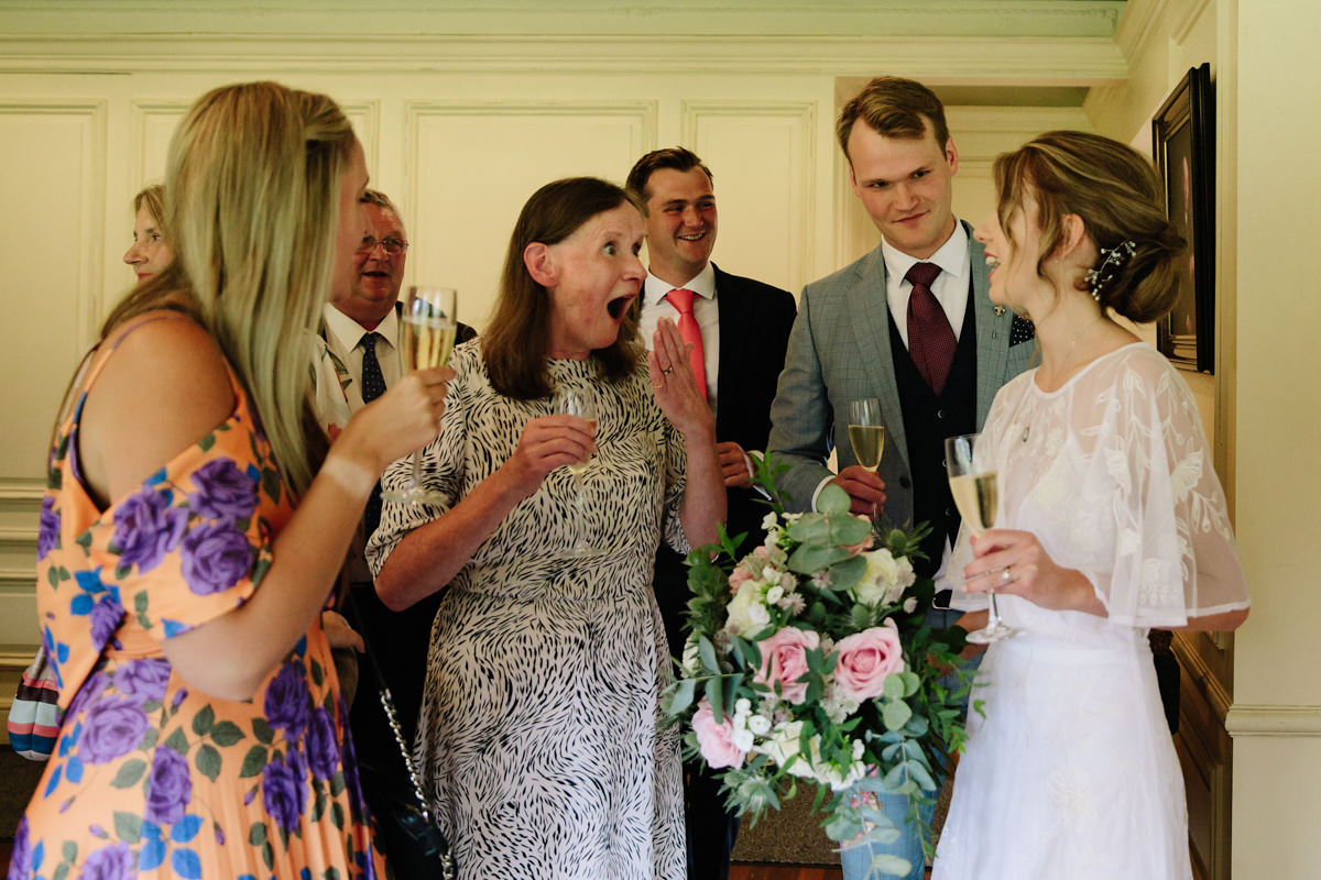 Guests congratulate the newly married couple