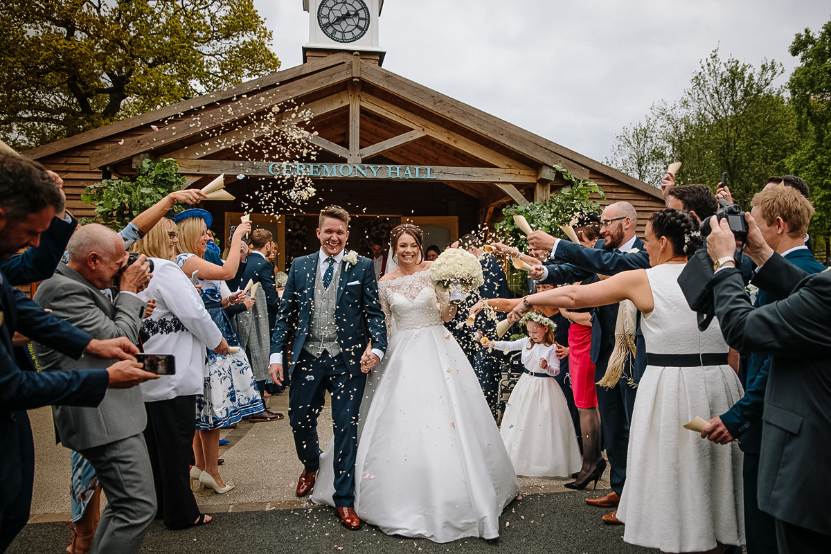 Fun Confetti Photo of the Bride and Groom at Colshaw Hall in Cheshire