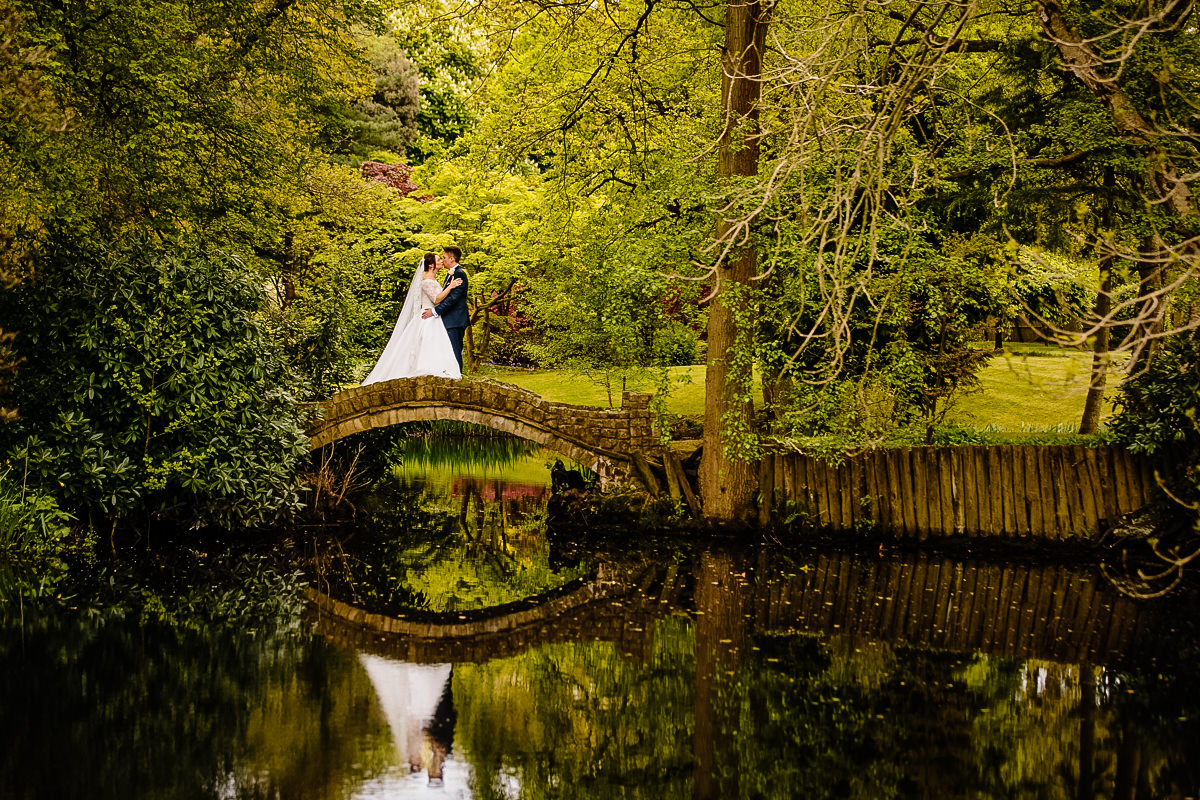 Bridge and reflections at Colshaw Hall Japanese gardens