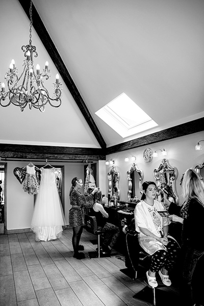 Bride and Bridesmaids getting hair and makeup in the Hen House Pamper Room at Heaton House Farm