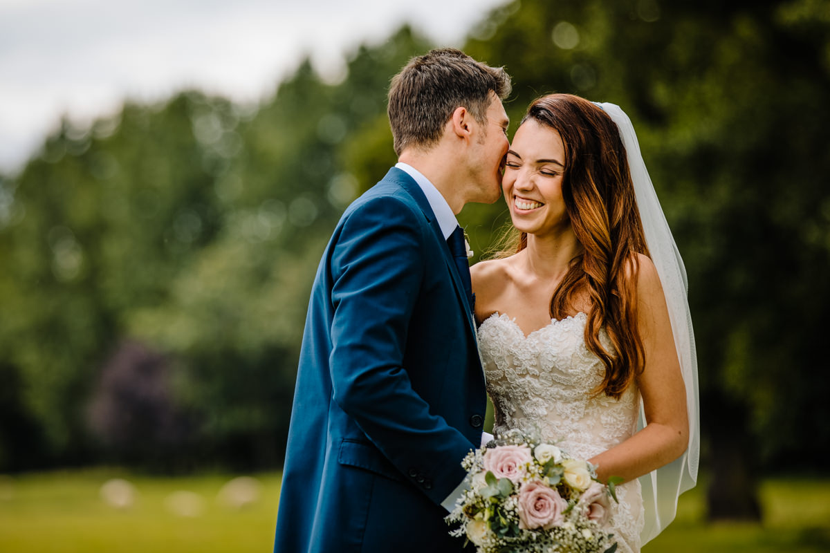 Fun moment between the bride and groom