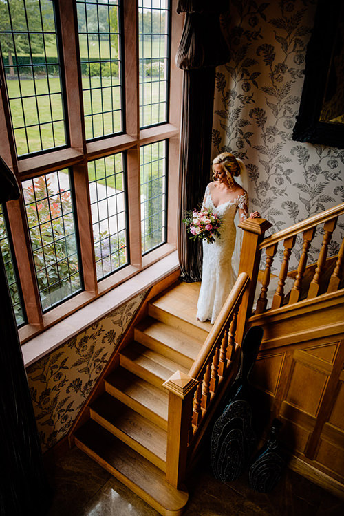 Bride on the staircase at Merrydale Manor