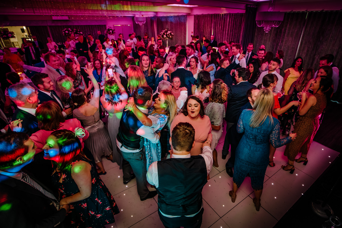 Wedding guests dancing the night away