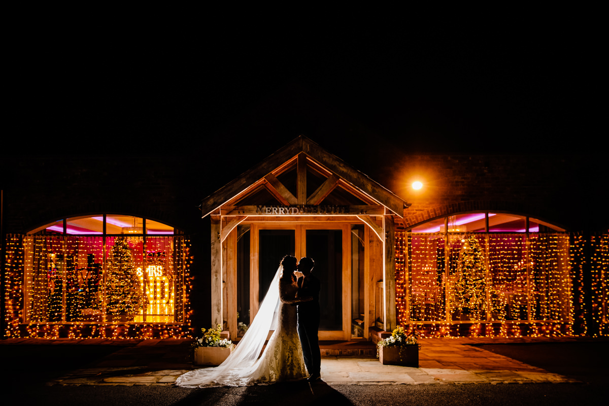 Merrydale Manor at night with fairy lights at Christmas, a lovely winter wedding