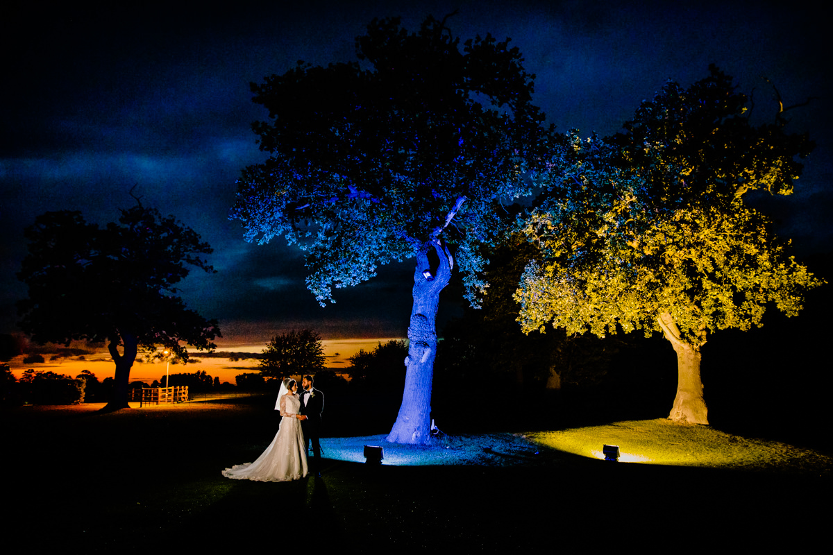 Creative night time photograph of the Bride and Groom at Merrydale Manor