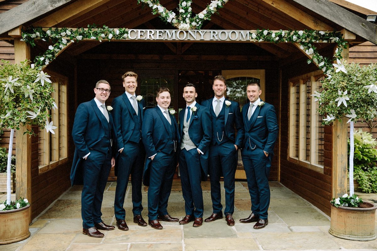 Groomsmen outside the ceremony room at Merrydale Manor