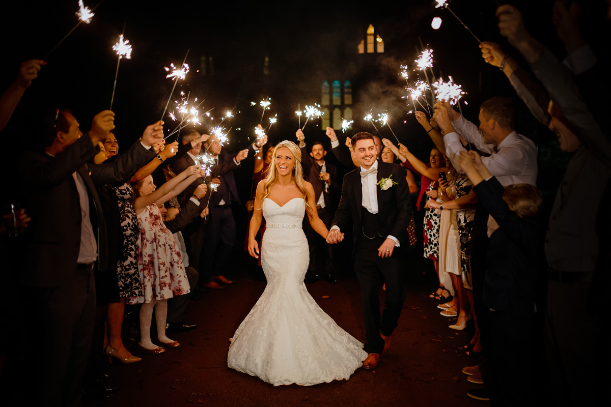 Sparkler exit with the bride and groom at Peckforton Castle