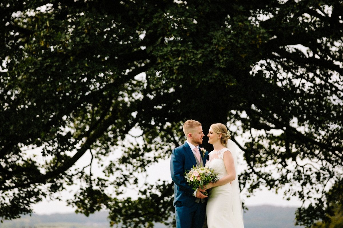 Loving moment between the bride and groom