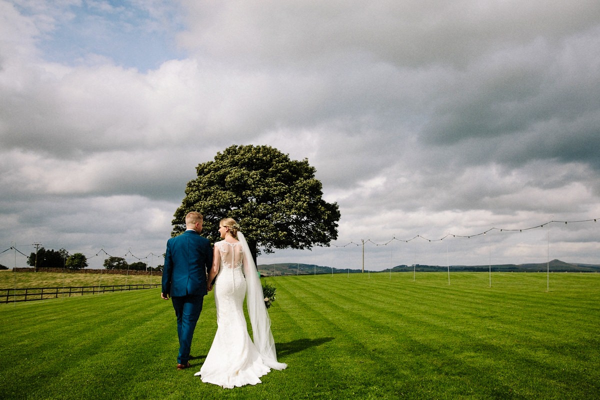 Brides stunning wedding dress from the back