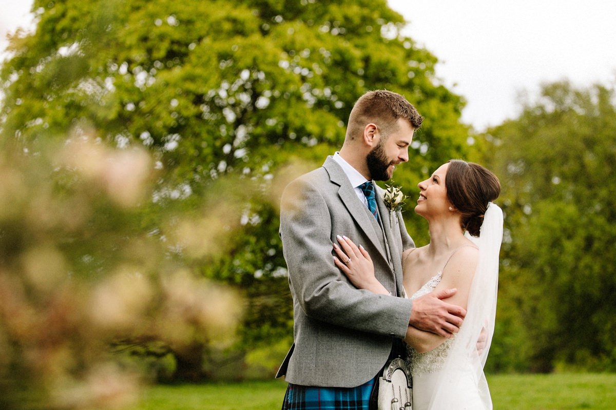 Gorgeous natural photography with the bride and groom at Arley Hall