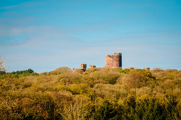 Peckforton Castle Cheshire view of the castle from the trees