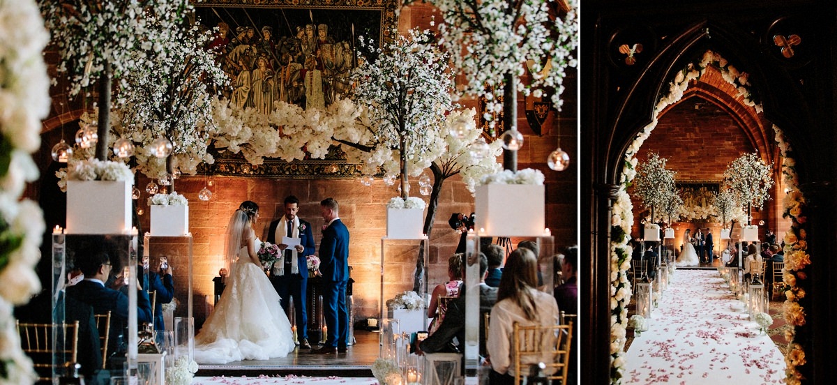 Wedding Ceremony with floral displays and candles at Peckforton Castle