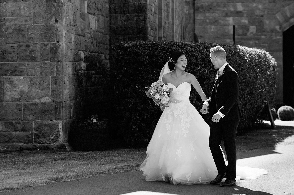 Natural fun moment with the bride and groom at Peckforton Castle