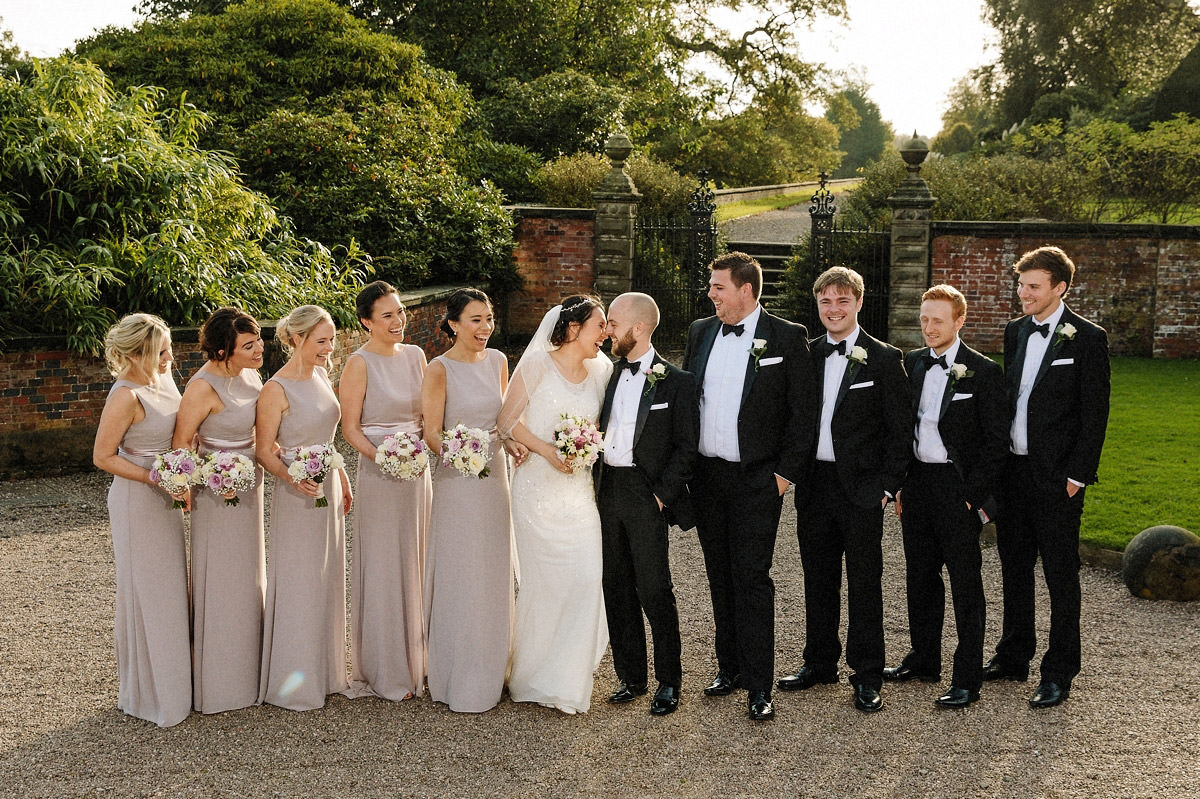 The bridal party with bridesmaids, groomsmen and the bride and groom