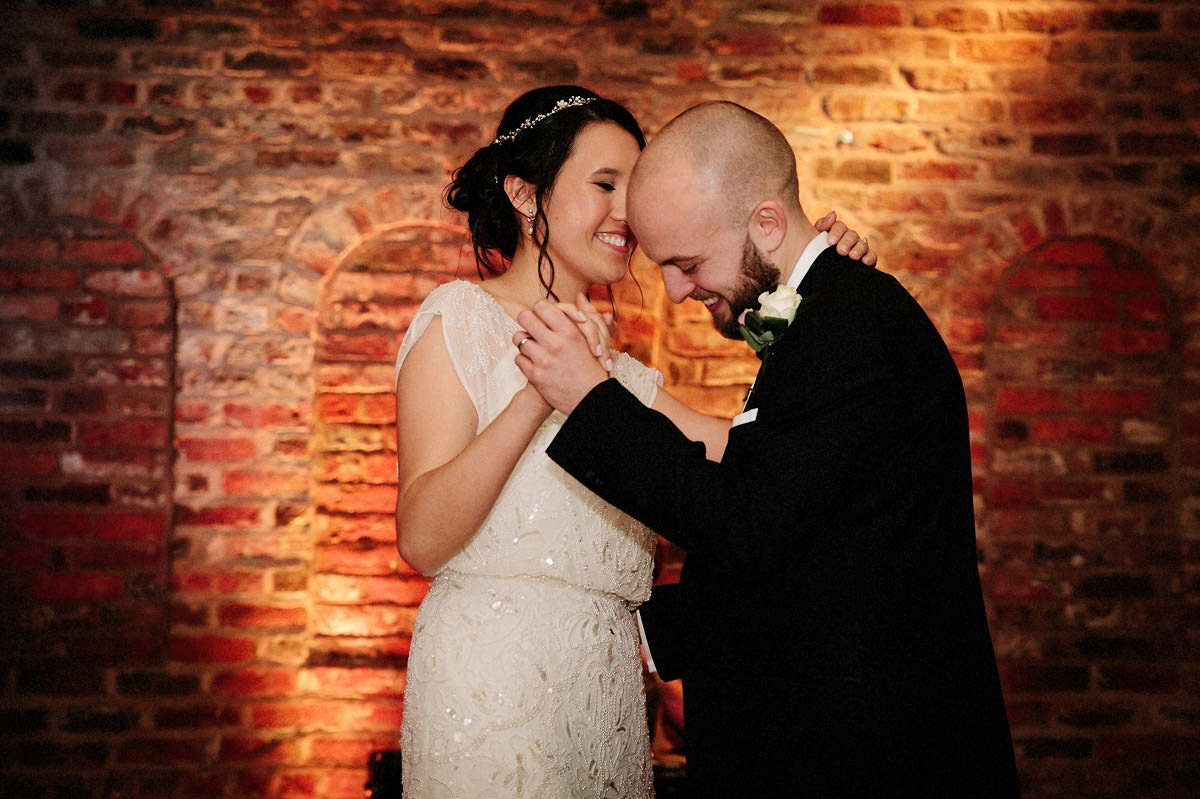 Bride and grooms first dance inside the Olympia at Arley Hall